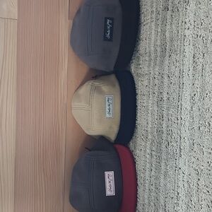 3 Obermeyer Hats-           Sold Seperate